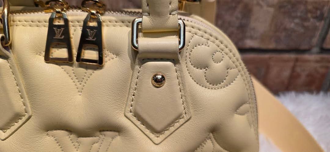 Authentic Louis Vuitton Alma BB Bubblegram Banane