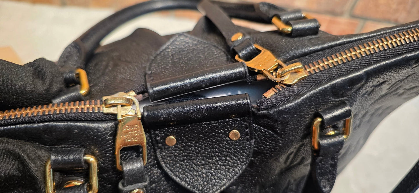 Authentic Louis Vuitton Mazarine MM Empreinte Noir