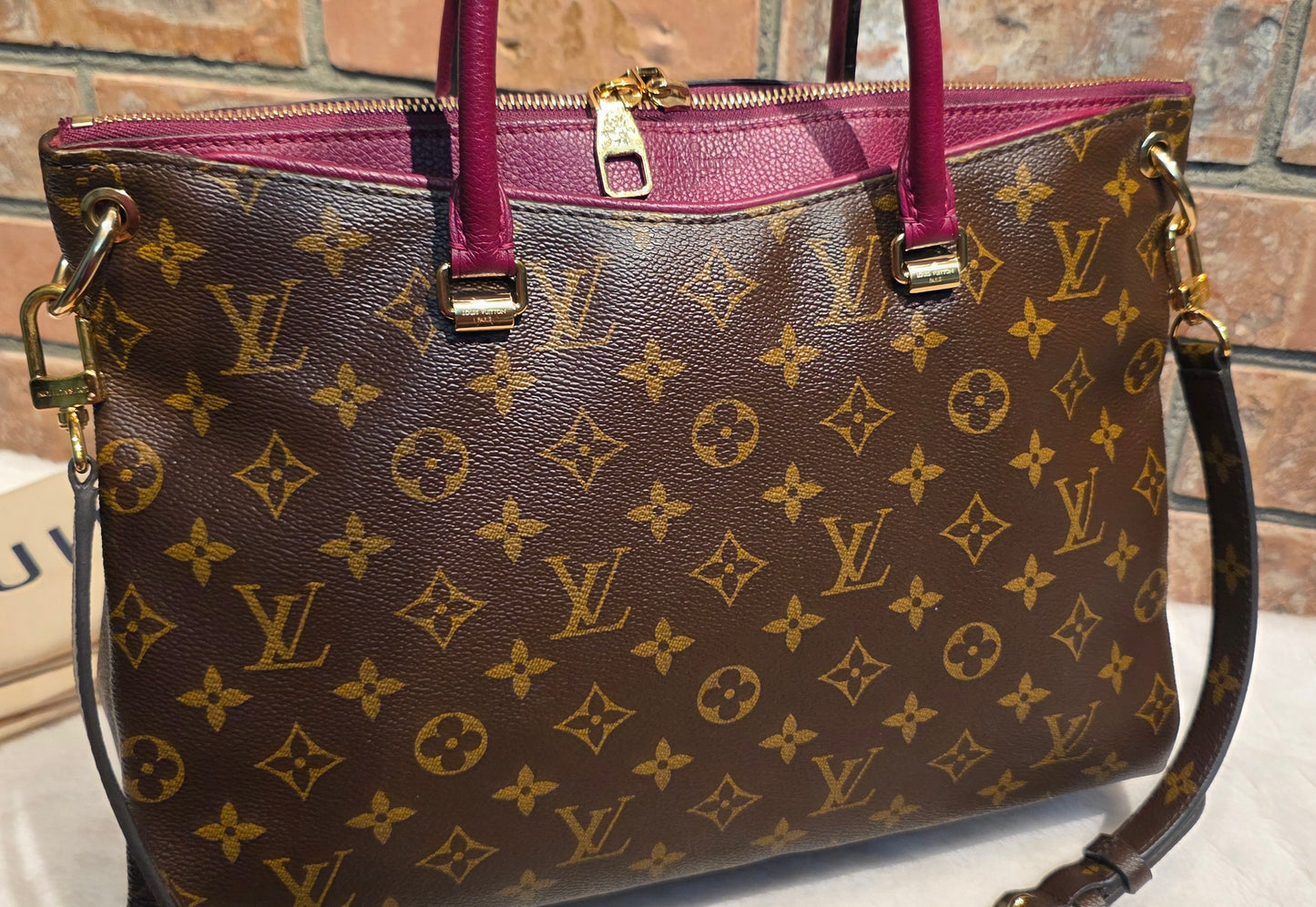 Authentic Louis Vuitton Pallas MM in Raisin