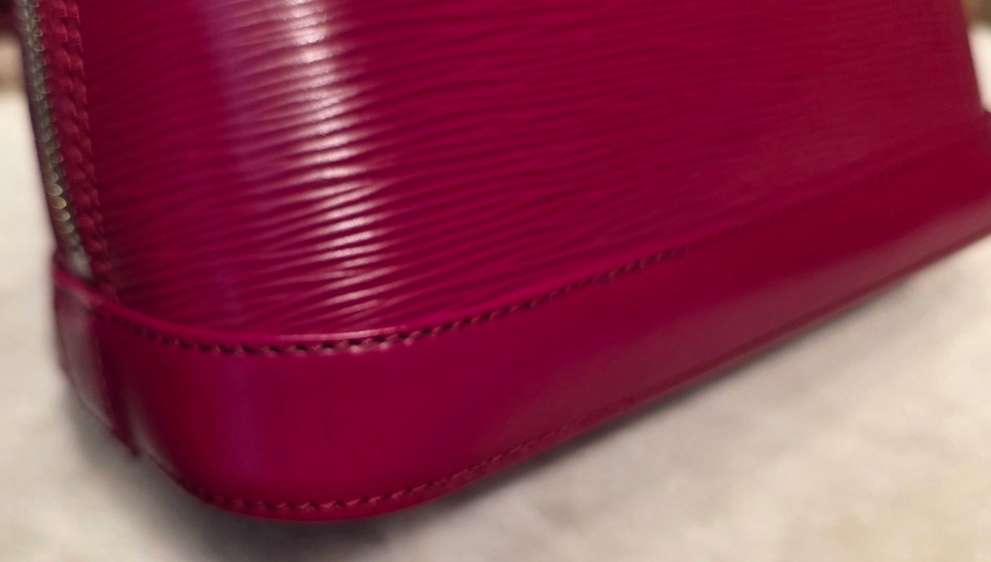 Authentic Louis Vuitton Alma BB Epi Leather in Fuchsia