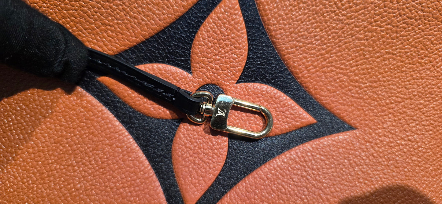 Authentic Louis Vuitton Crafty NeoNoe MM Giant Monogram in Caramel