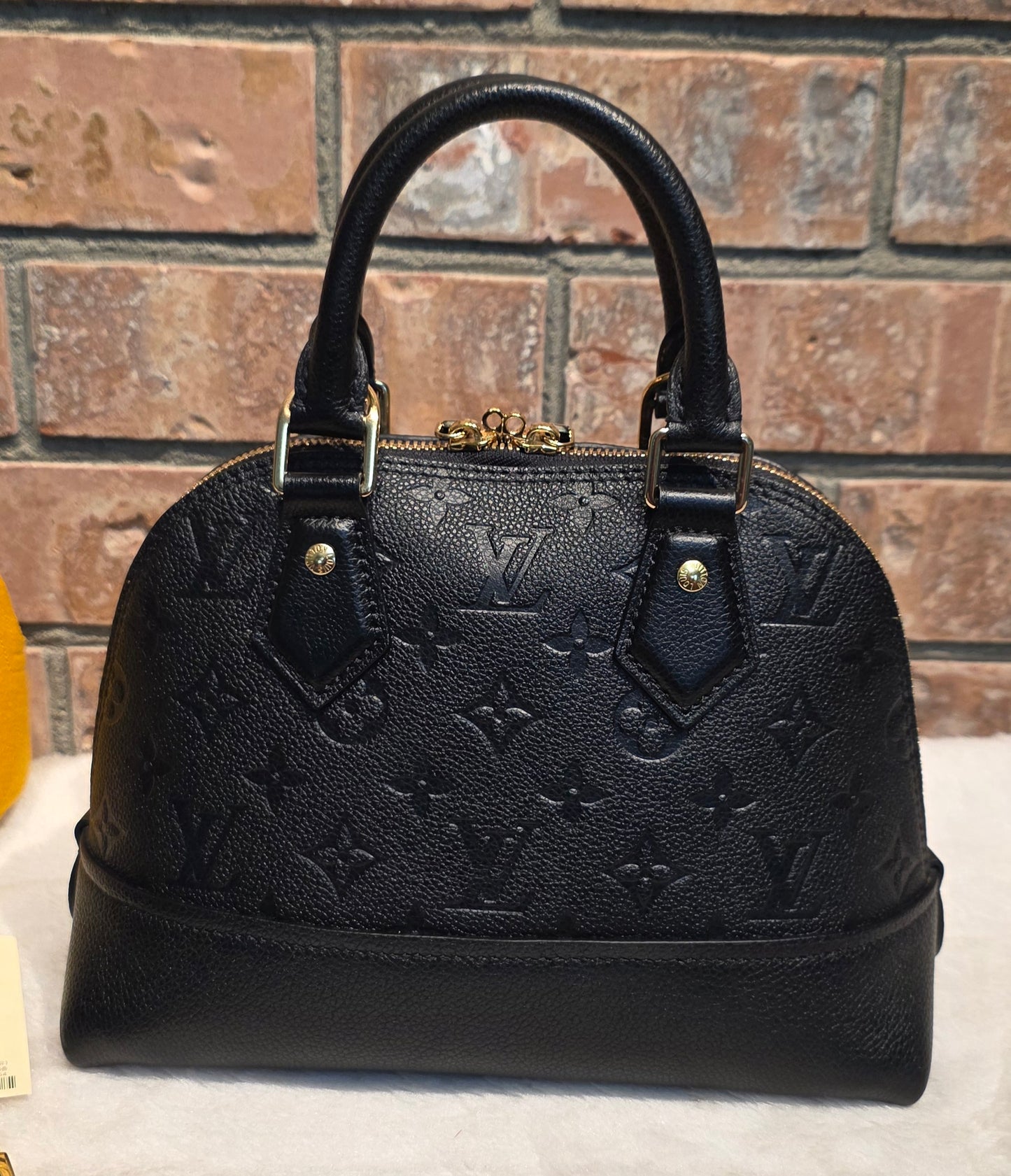 Authentic Louis Vuitton Neo Alma BB Empreinte Noir