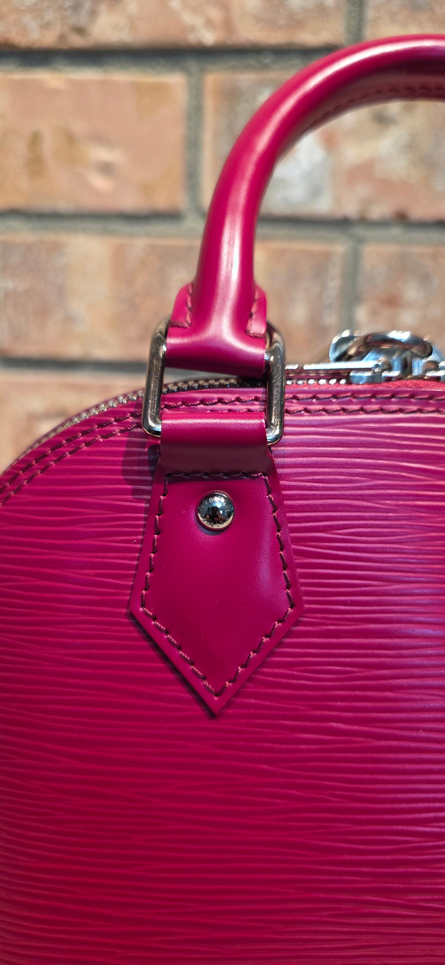 Authentic Louis Vuitton Alma BB Epi Leather in Fuchsia
