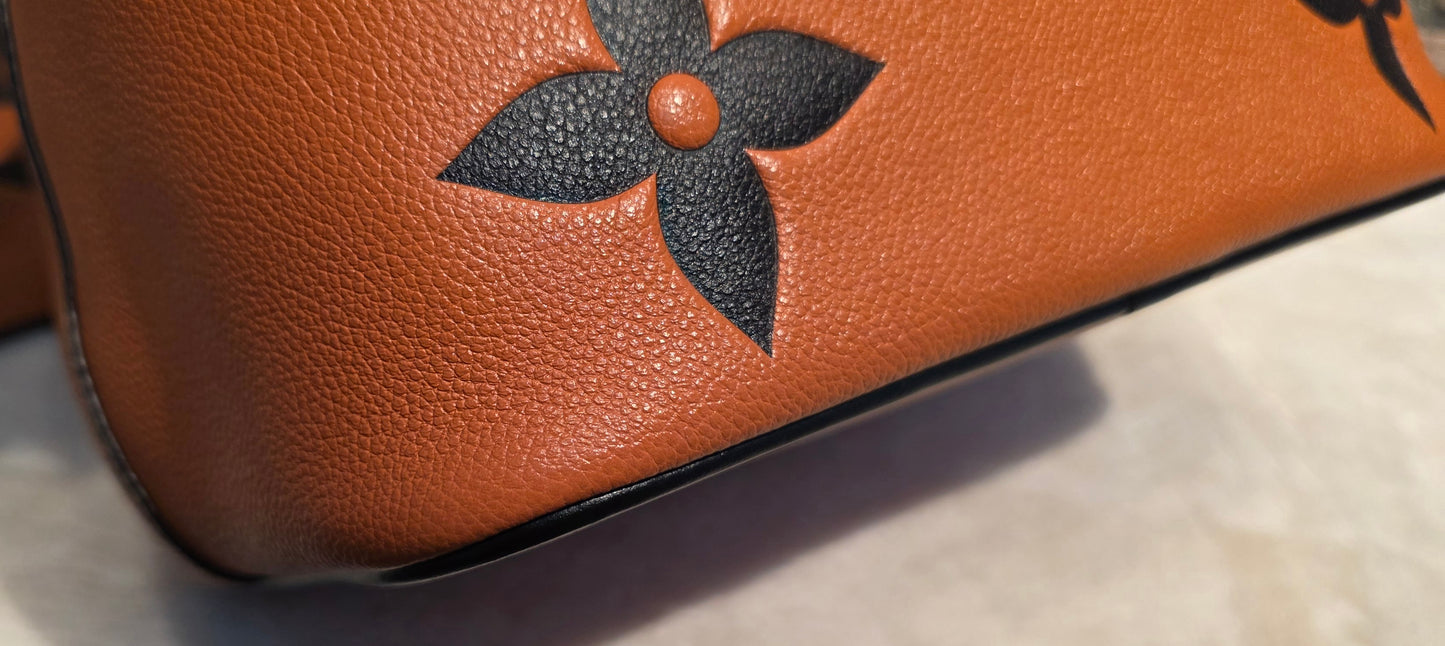 Authentic Louis Vuitton Crafty NeoNoe MM Giant Monogram in Caramel