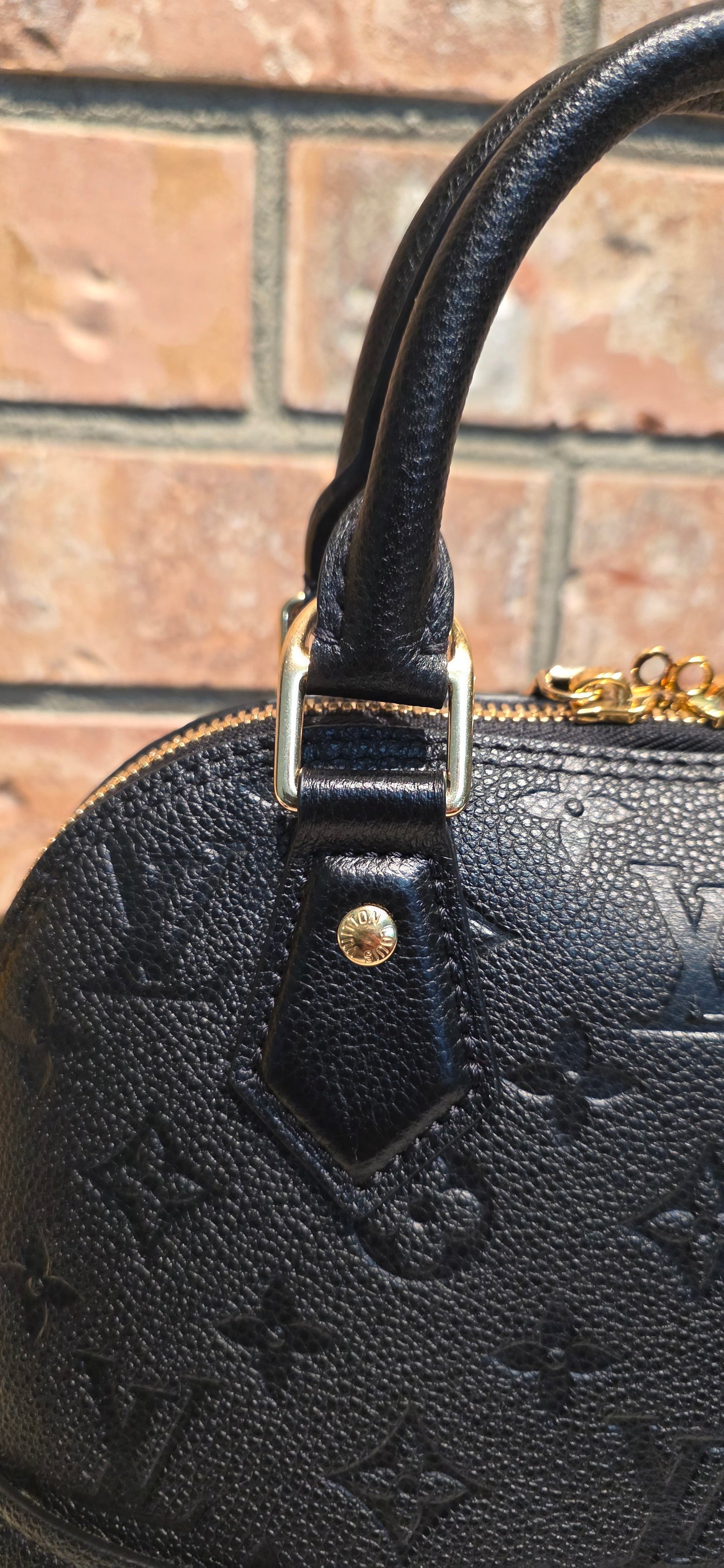 Authentic Louis Vuitton Neo Alma BB Empreinte Noir