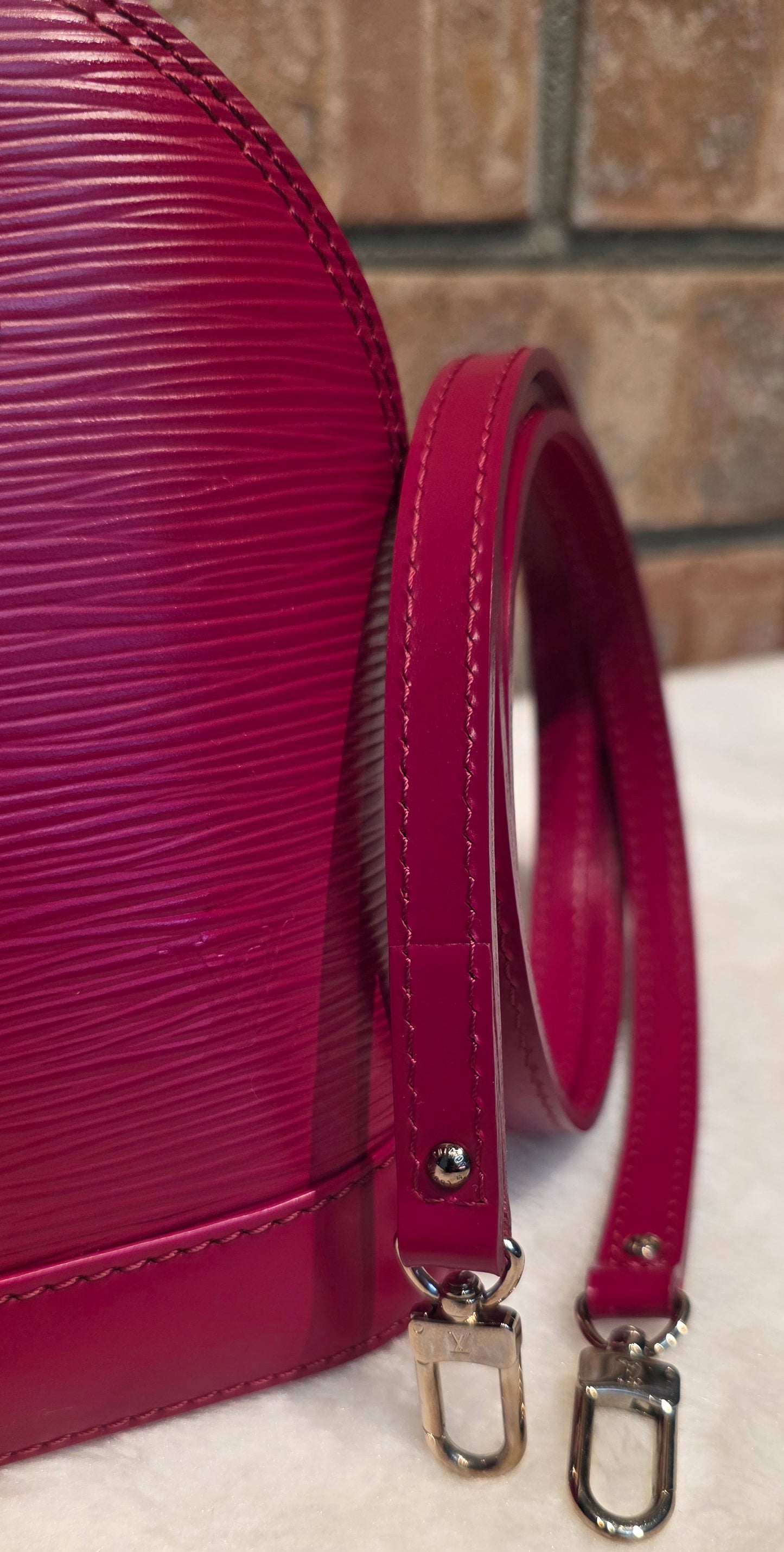 Authentic Louis Vuitton Alma BB Epi Leather in Fuchsia