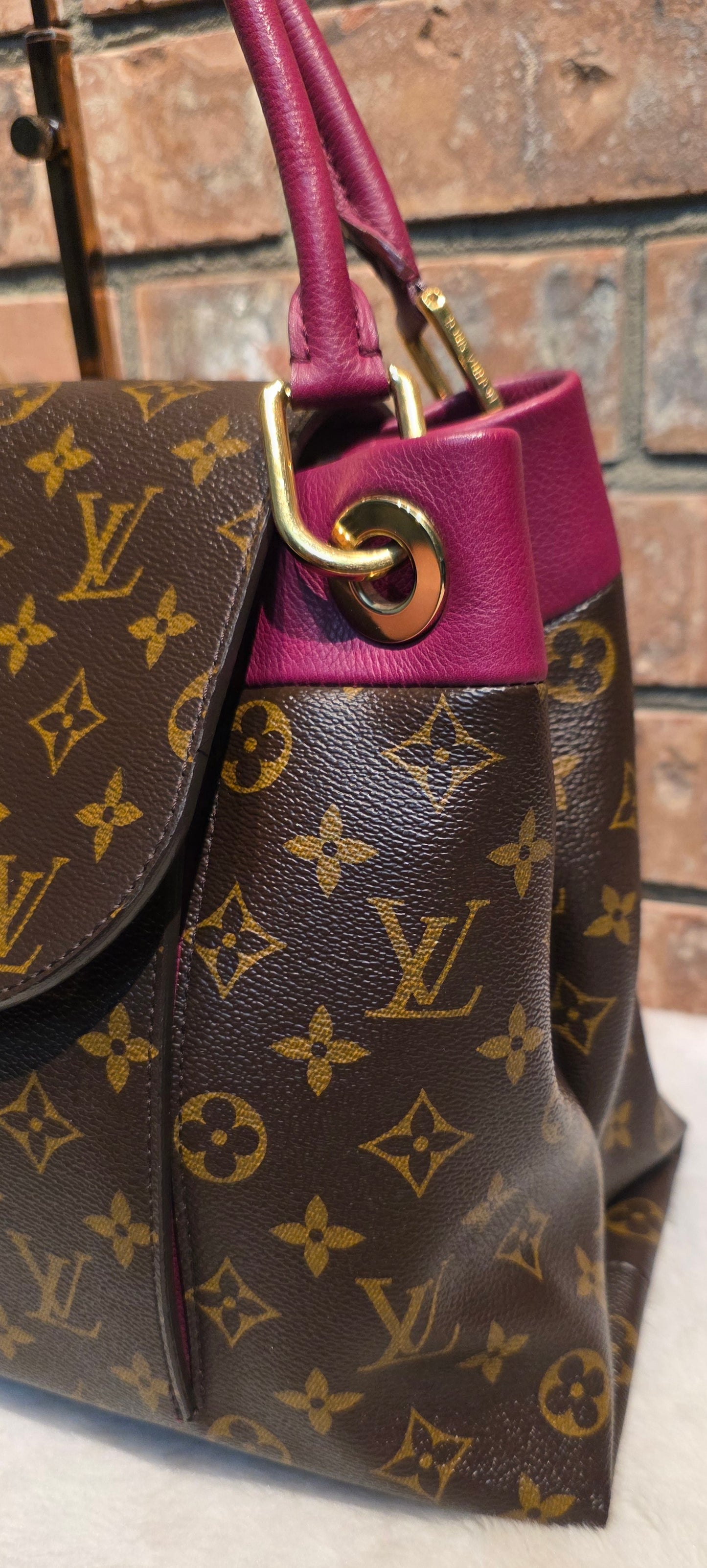 Authentic Louis Vuitton Olympe in Aurore