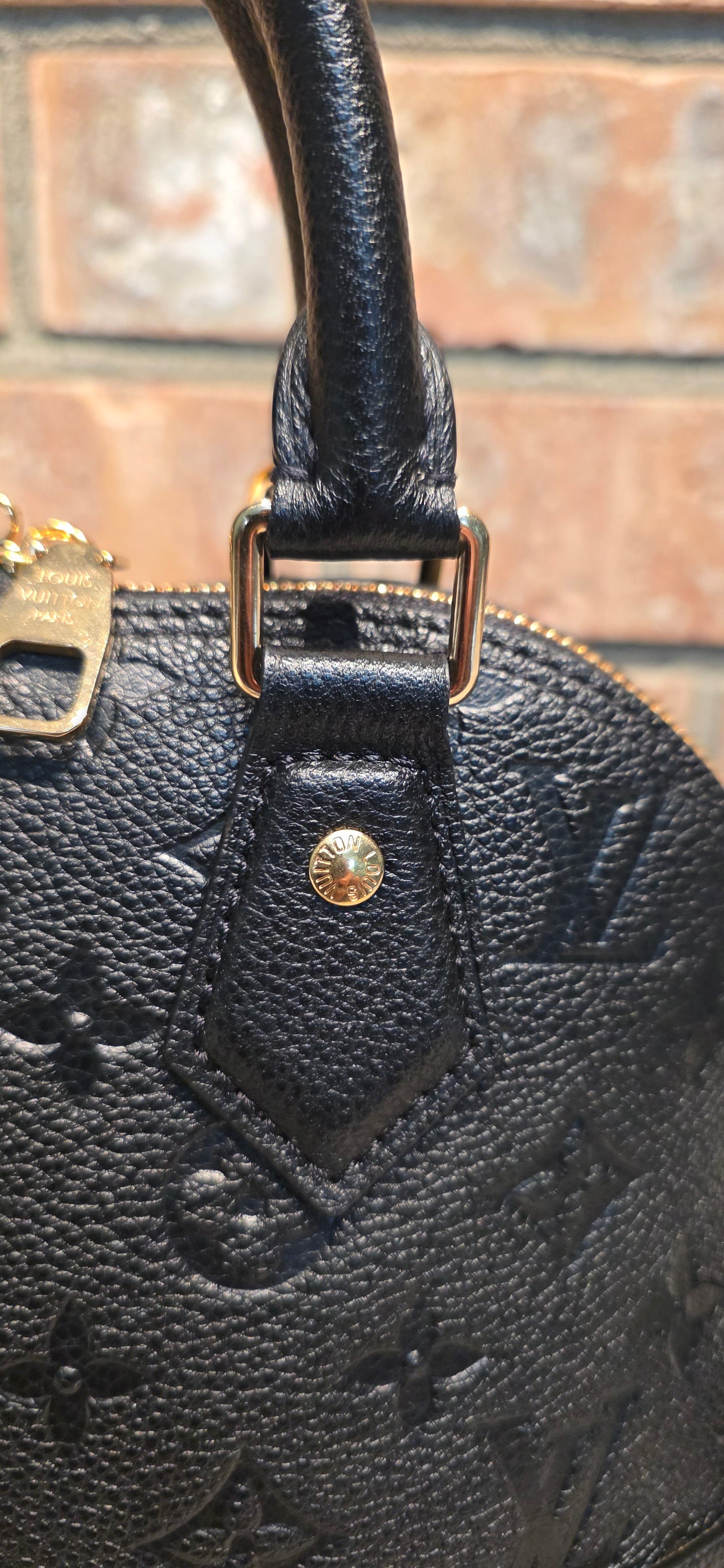 Authentic Louis Vuitton Neo Alma BB Empreinte Noir