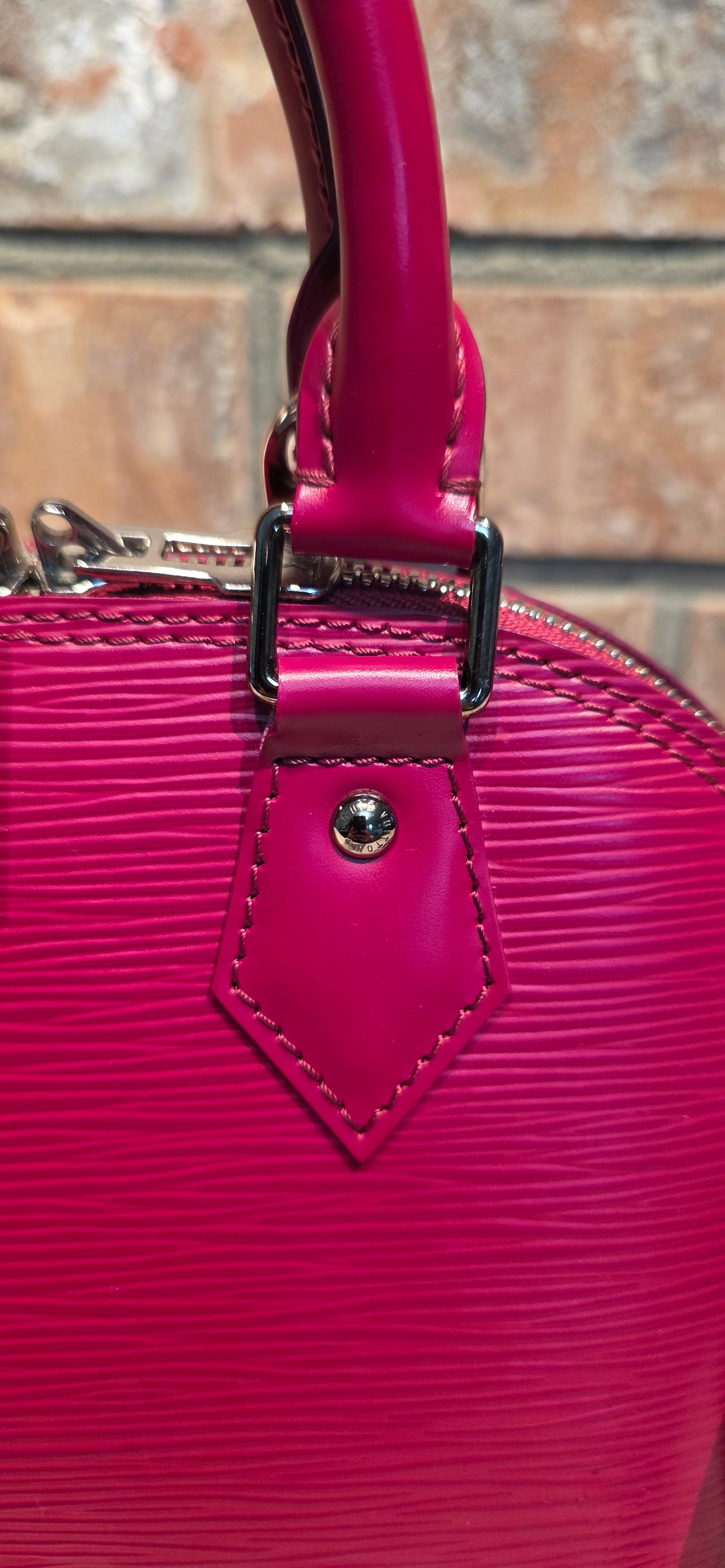 Authentic Louis Vuitton Alma BB Epi Leather in Fuchsia