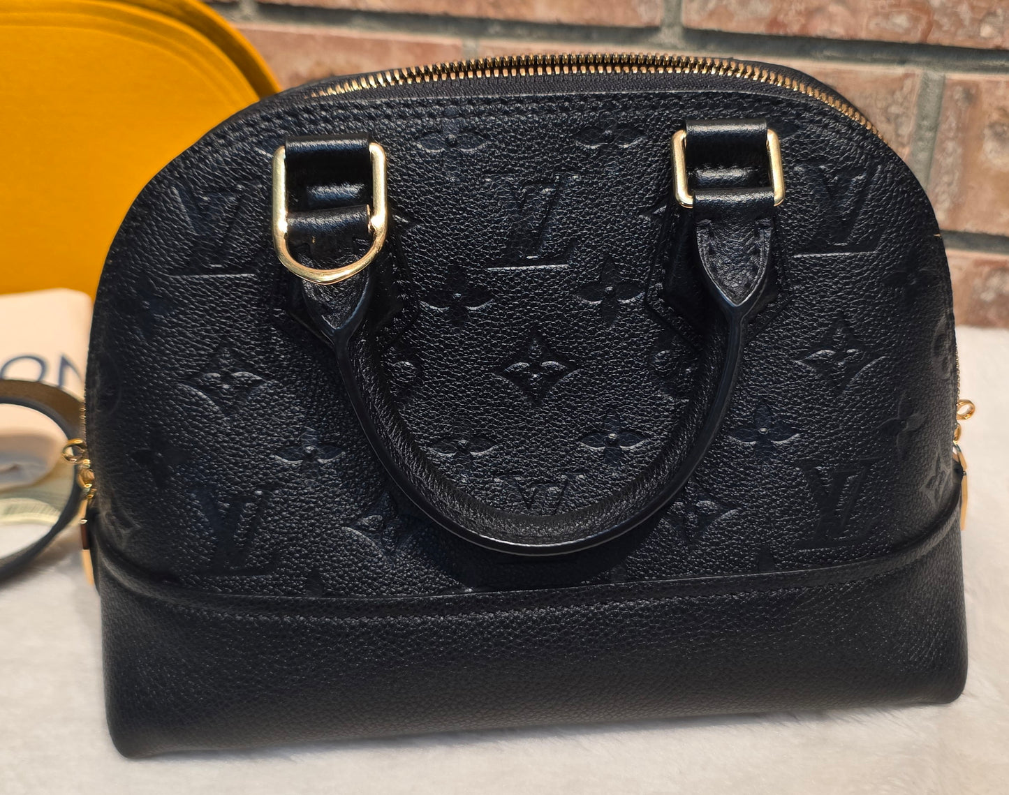 Authentic Louis Vuitton Neo Alma BB Empreinte Noir