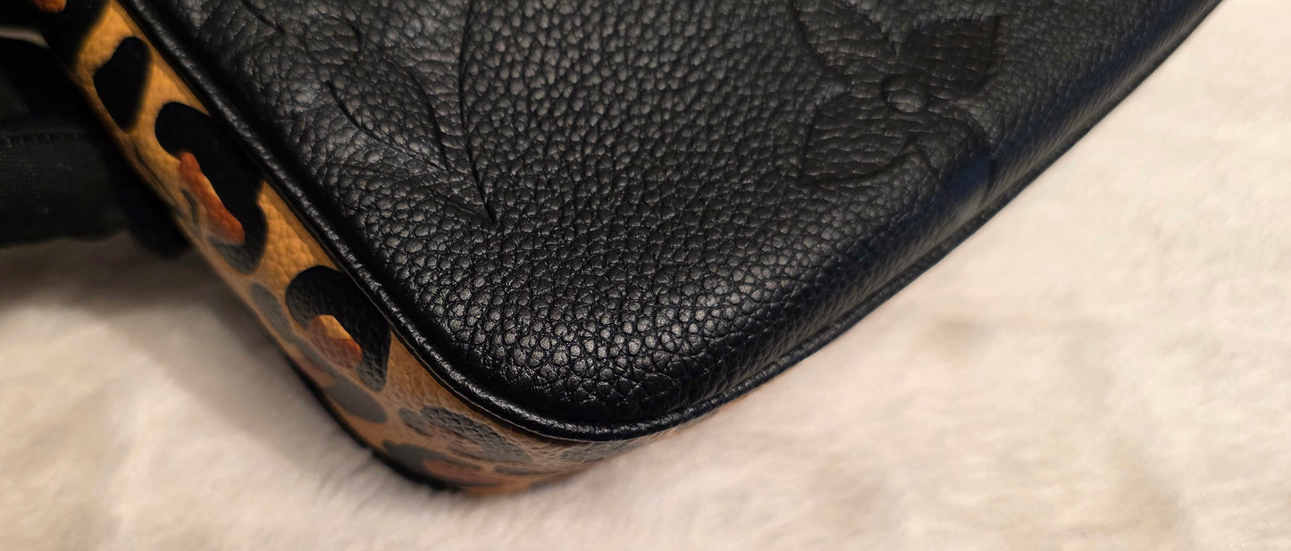 Authentic Louis Vuitton Multipochette Accessoires Wild At Heart