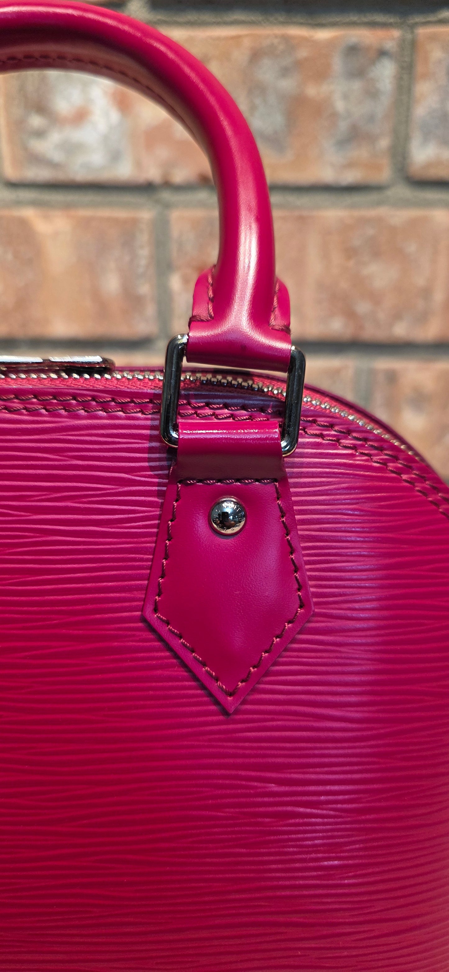 Authentic Louis Vuitton Alma BB Epi Leather in Fuchsia
