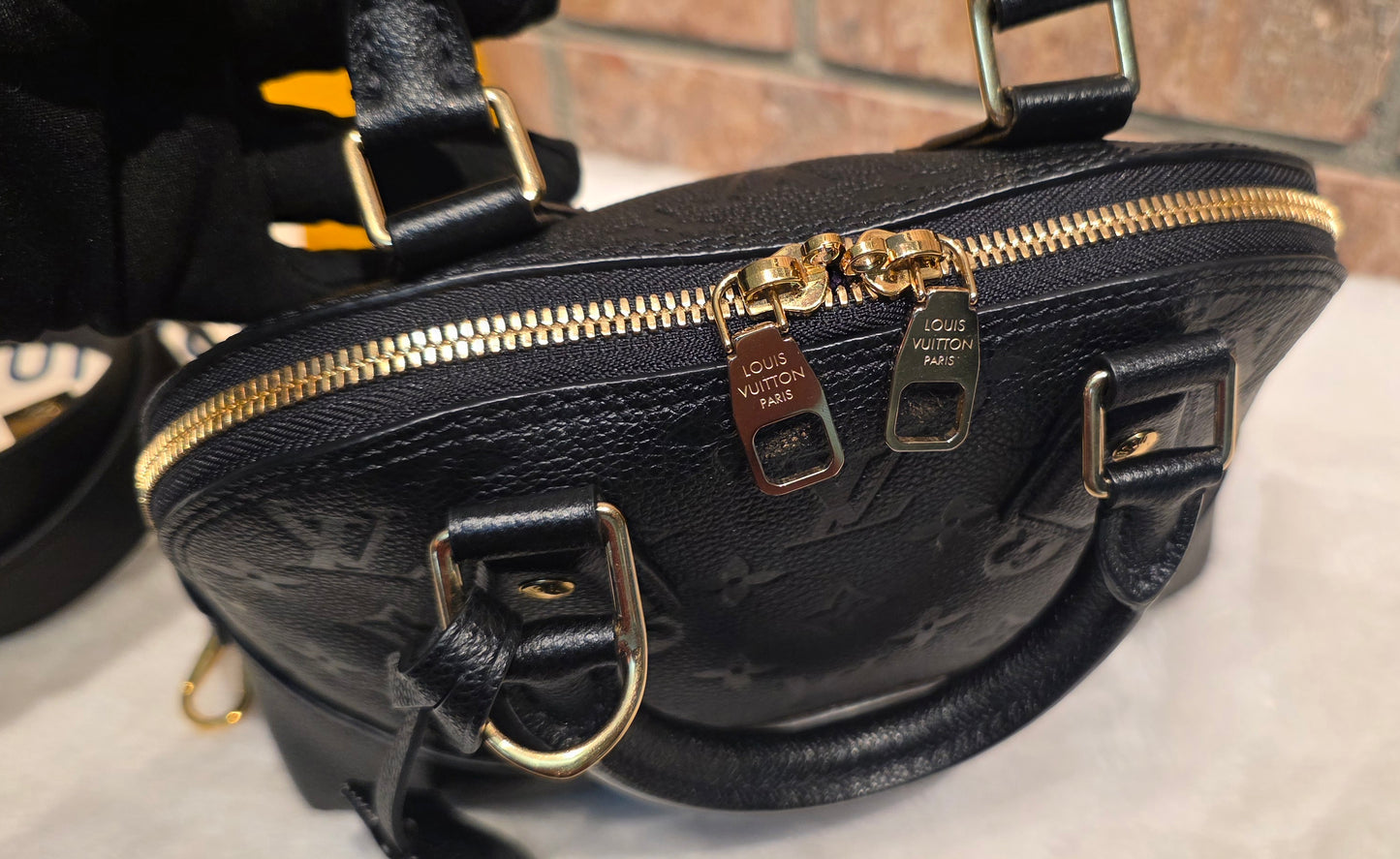 Authentic Louis Vuitton Neo Alma BB Empreinte Noir