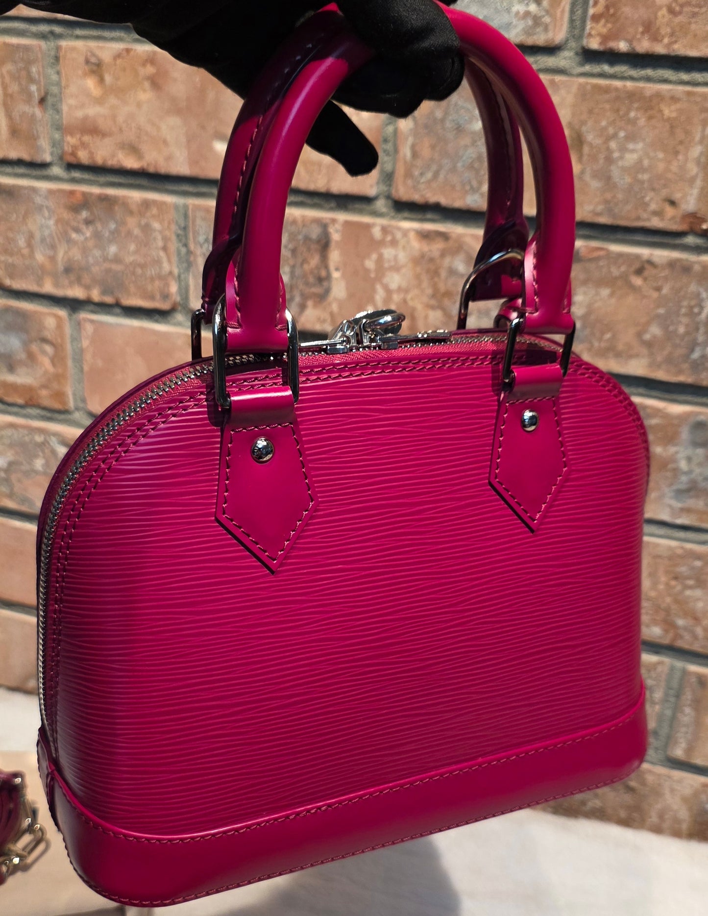 Authentic Louis Vuitton Alma BB Epi Leather in Fuchsia