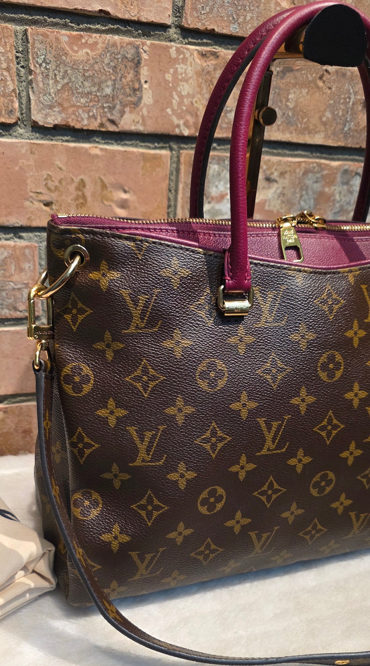 Authentic Louis Vuitton Pallas MM in Raisin