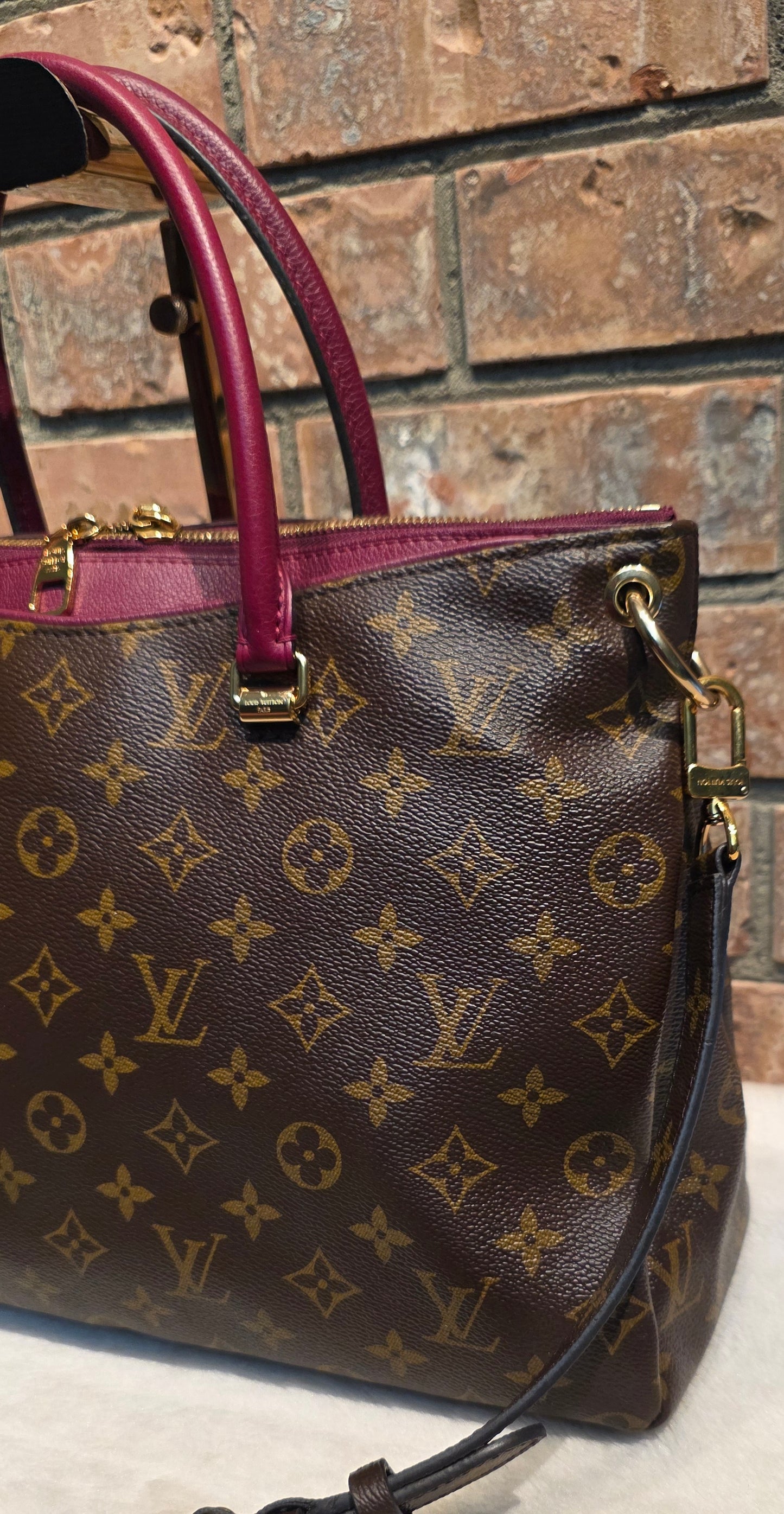 Authentic Louis Vuitton Pallas MM in Raisin