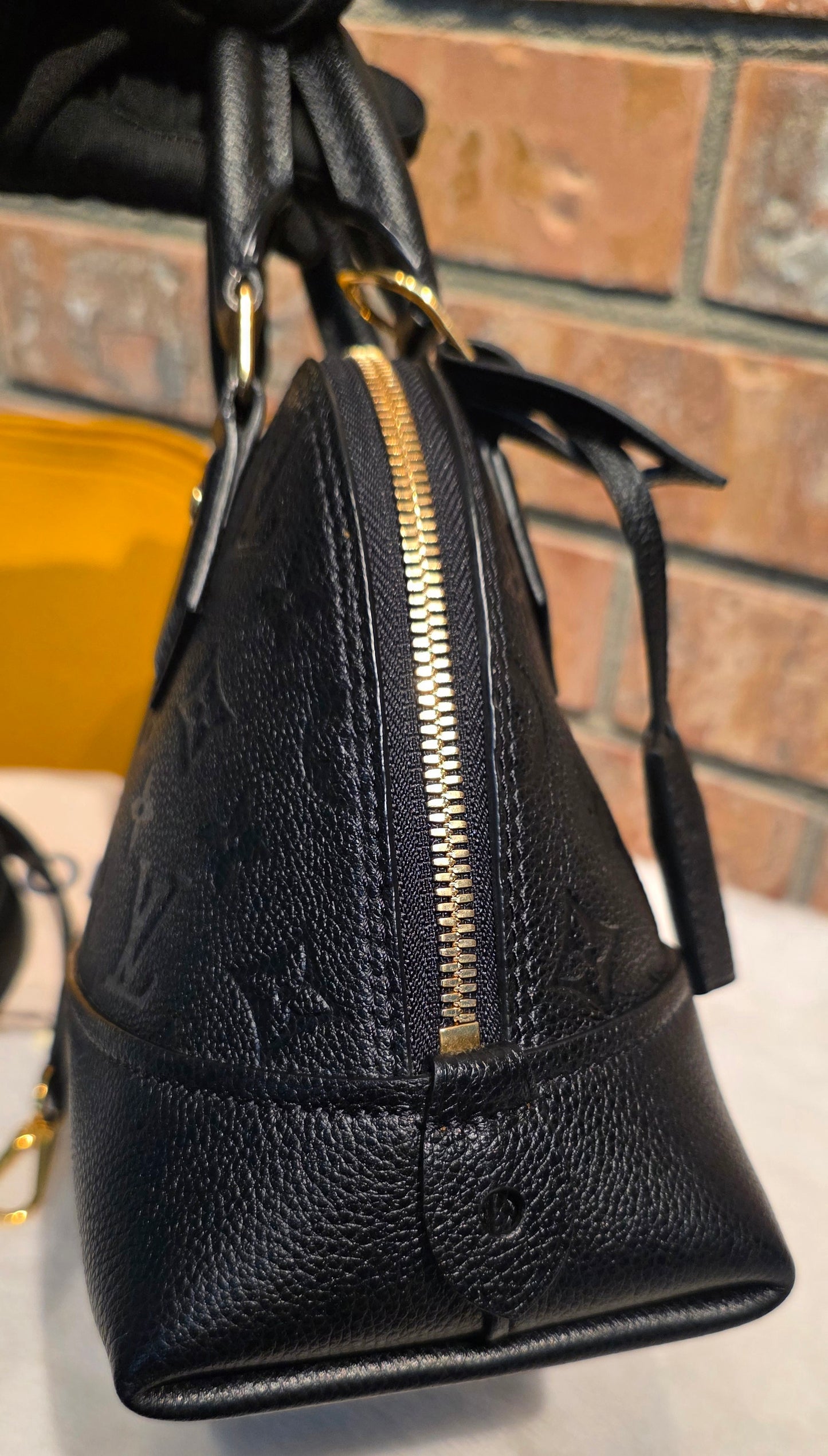 Authentic Louis Vuitton Neo Alma BB Empreinte Noir