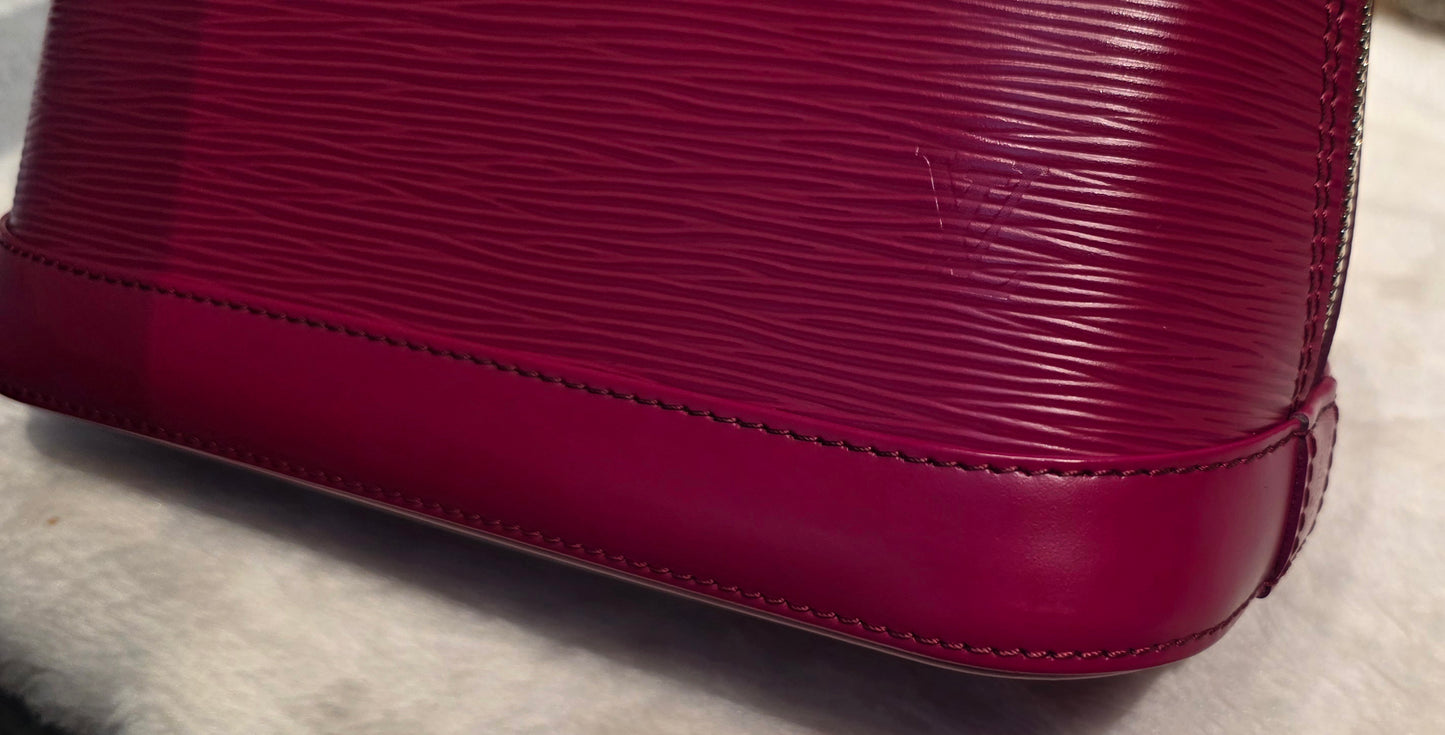 Authentic Louis Vuitton Alma BB Epi Leather in Fuchsia
