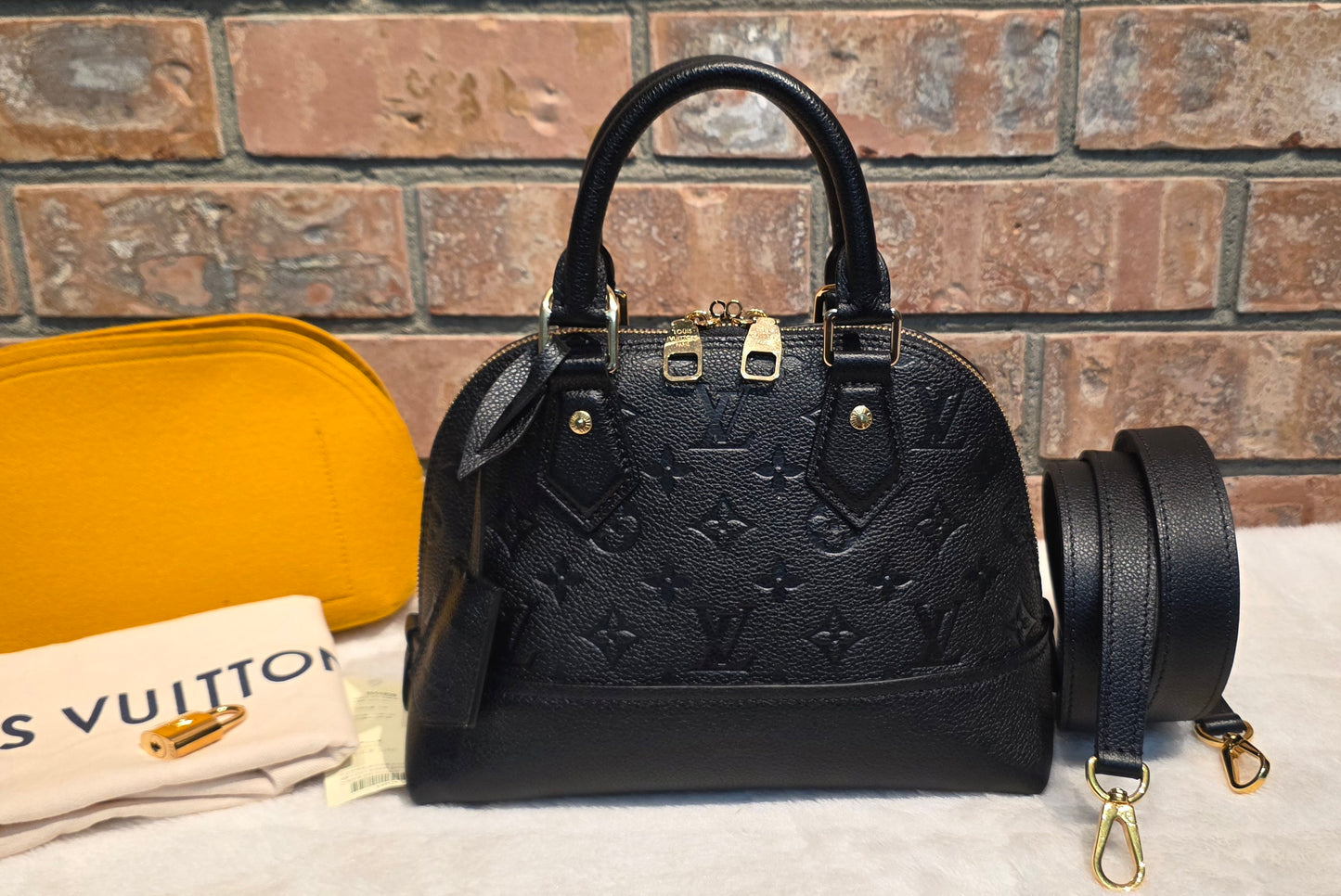 Authentic Louis Vuitton Neo Alma BB Empreinte Noir