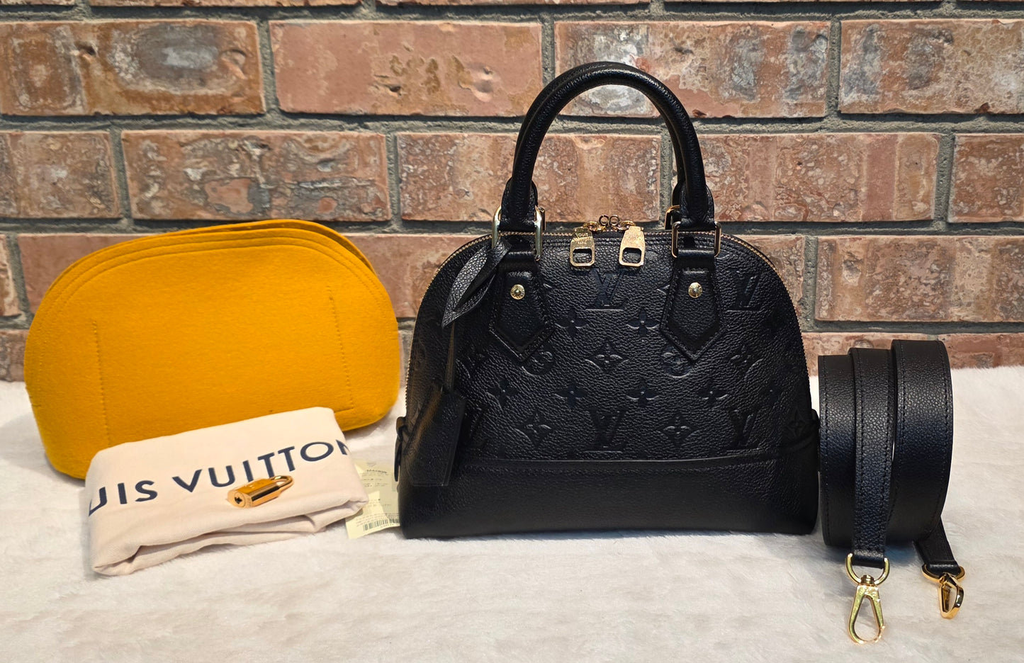 Authentic Louis Vuitton Neo Alma BB Empreinte Noir