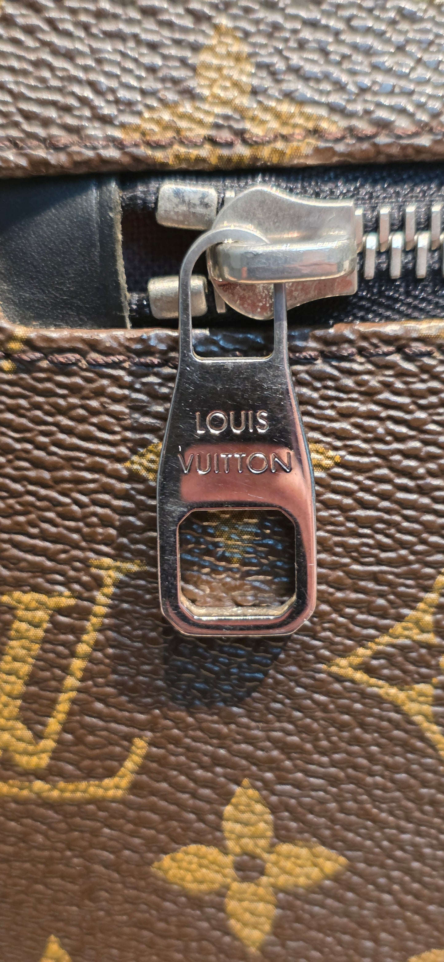 Authentic Louis Vuitton Monogram Macassar District MM