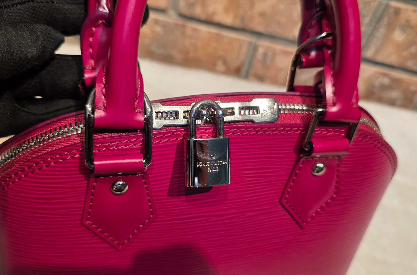 Authentic Louis Vuitton Alma BB Epi Leather in Fuchsia