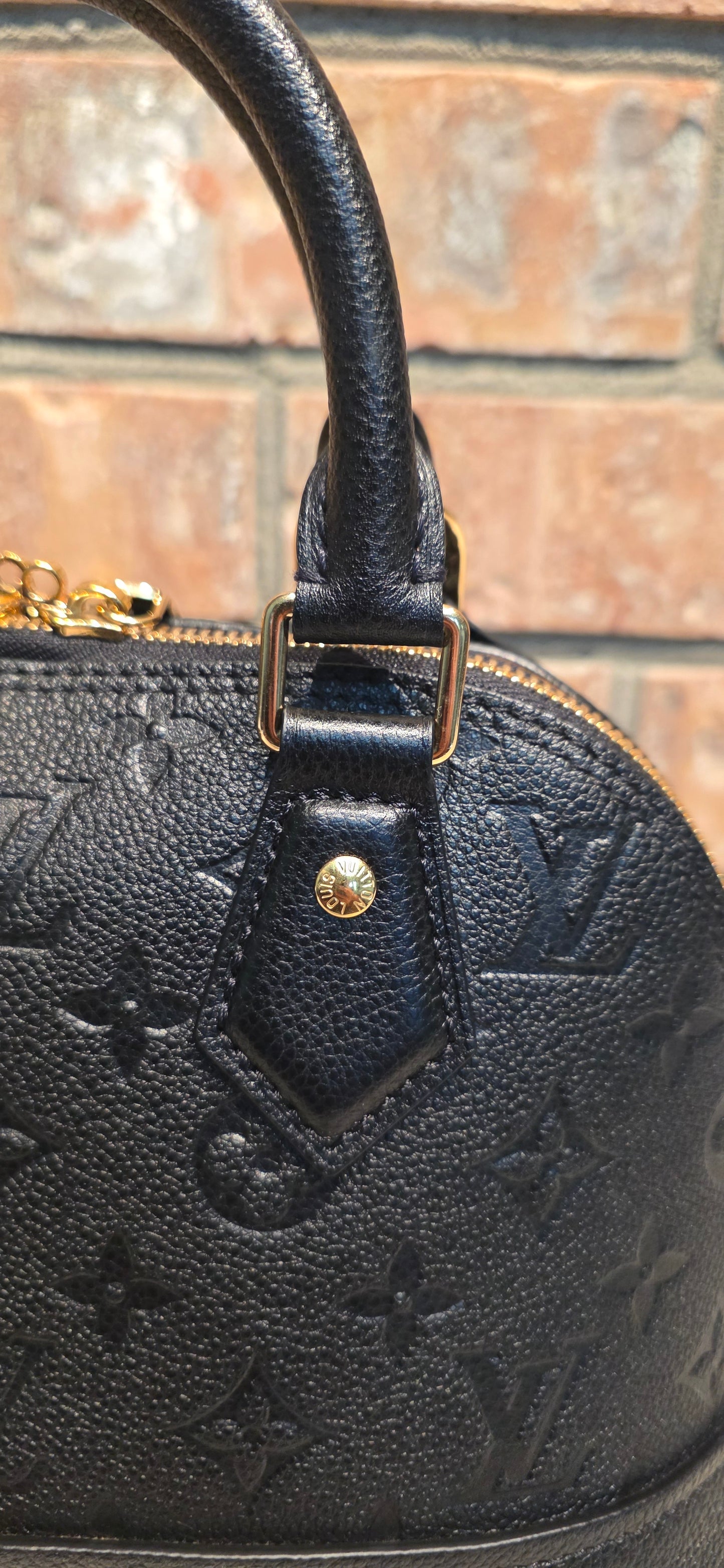 Authentic Louis Vuitton Neo Alma BB Empreinte Noir