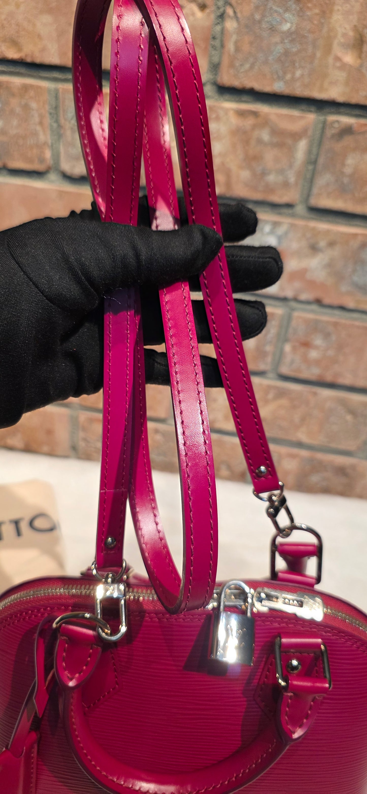 Authentic Louis Vuitton Alma BB Epi Leather in Fuchsia