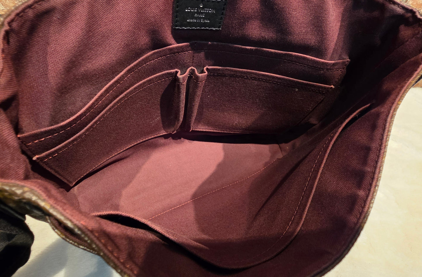 Authentic Louis Vuitton Monogram Macassar District MM