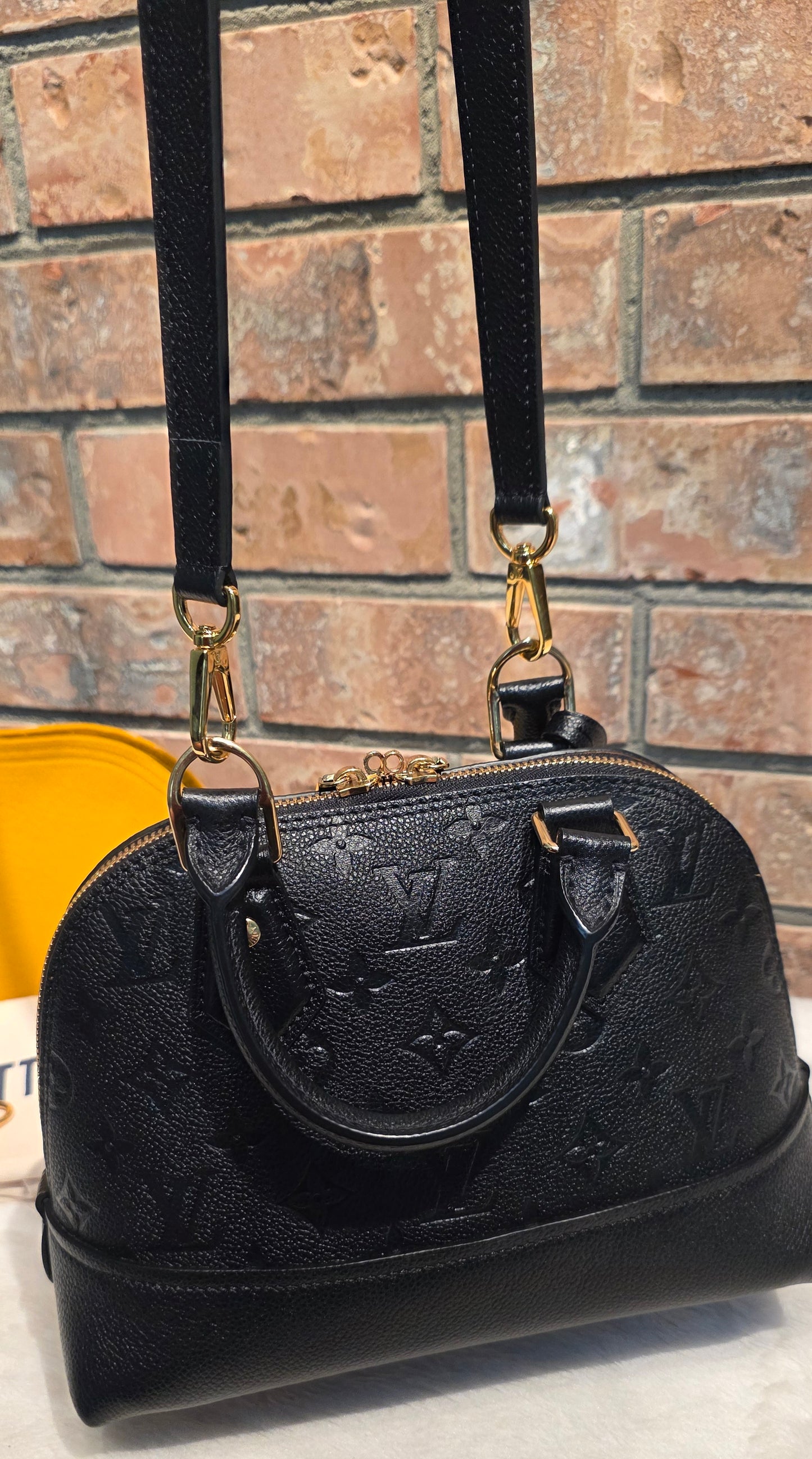 Authentic Louis Vuitton Neo Alma BB Empreinte Noir