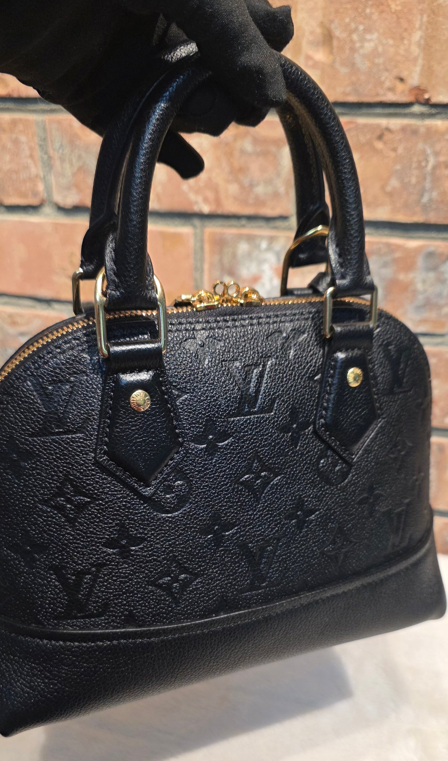 Authentic Louis Vuitton Neo Alma BB Empreinte Noir
