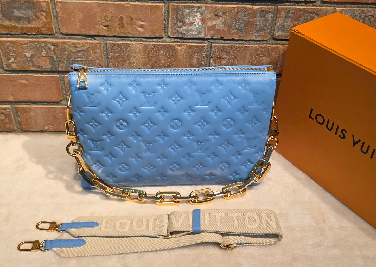 Authentic Louis Vuitton Coussin MM Embossed Monogram in Bleuet