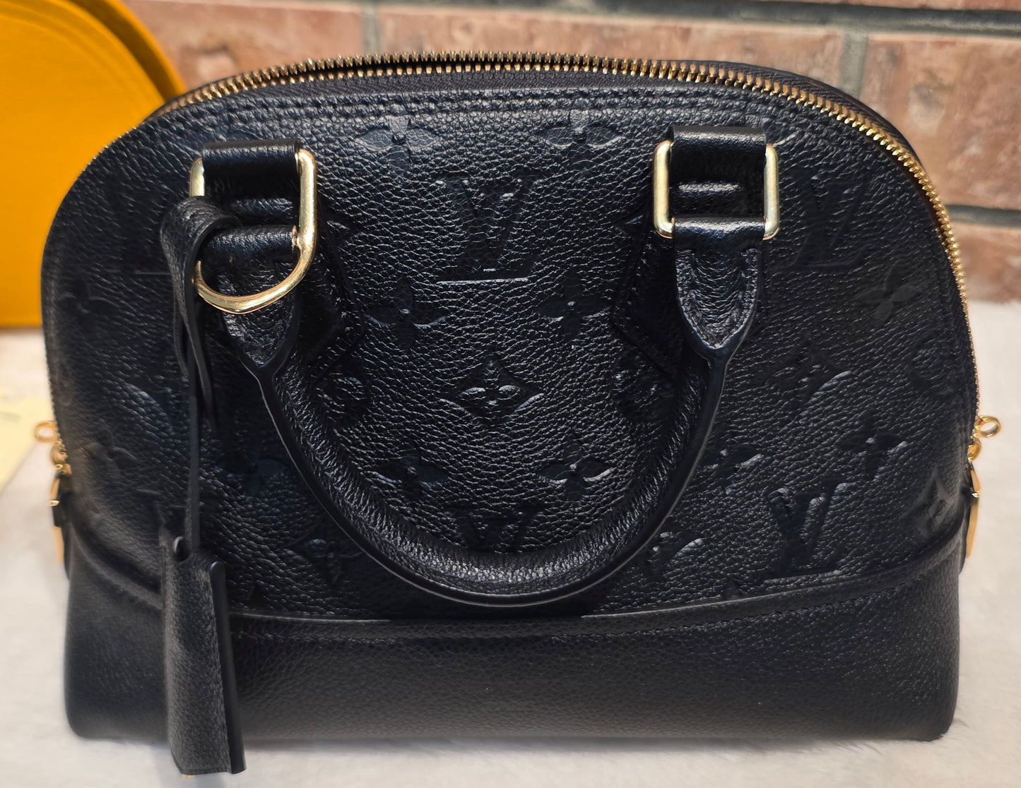 Authentic Louis Vuitton Neo Alma BB Empreinte Noir