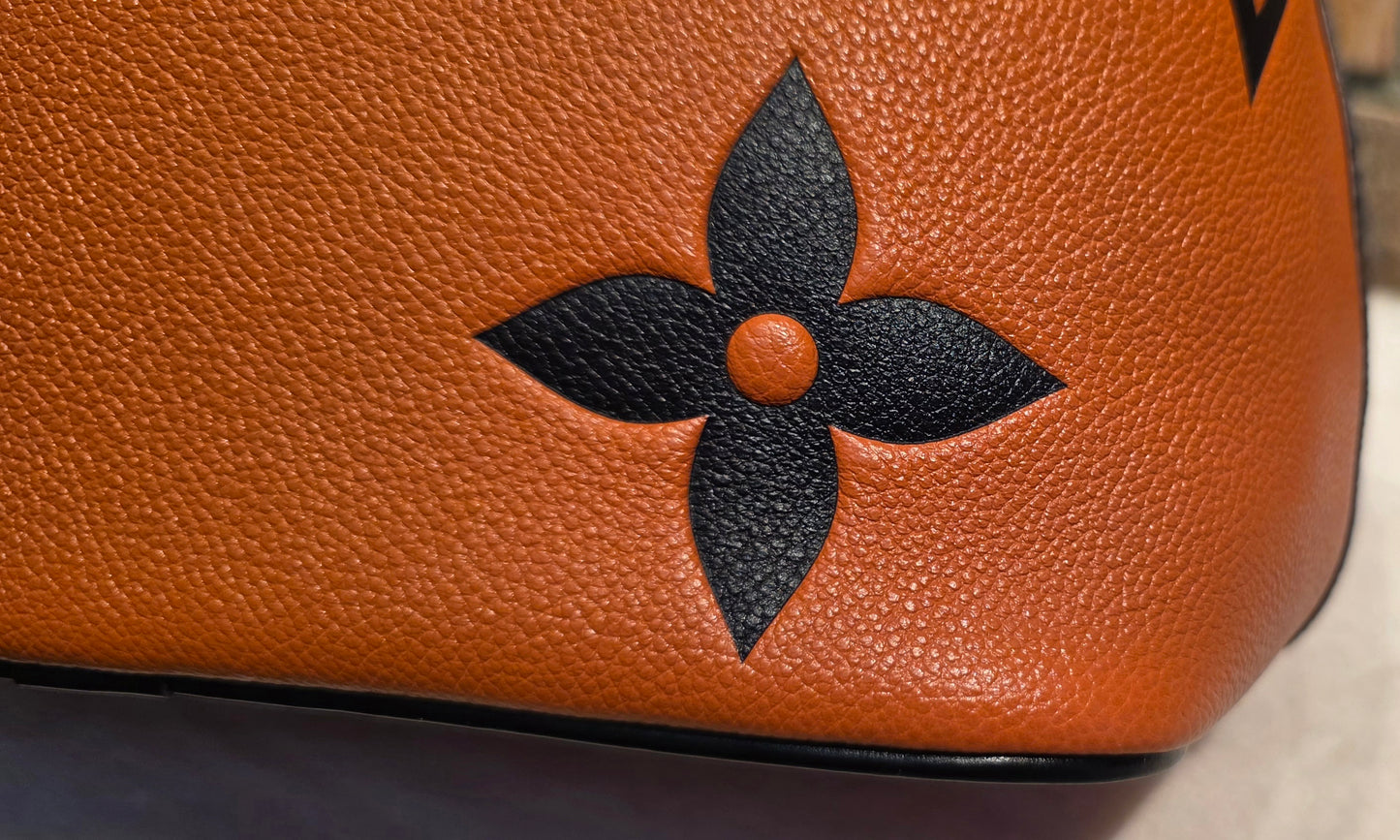 Authentic Louis Vuitton Crafty NeoNoe MM Giant Monogram in Caramel