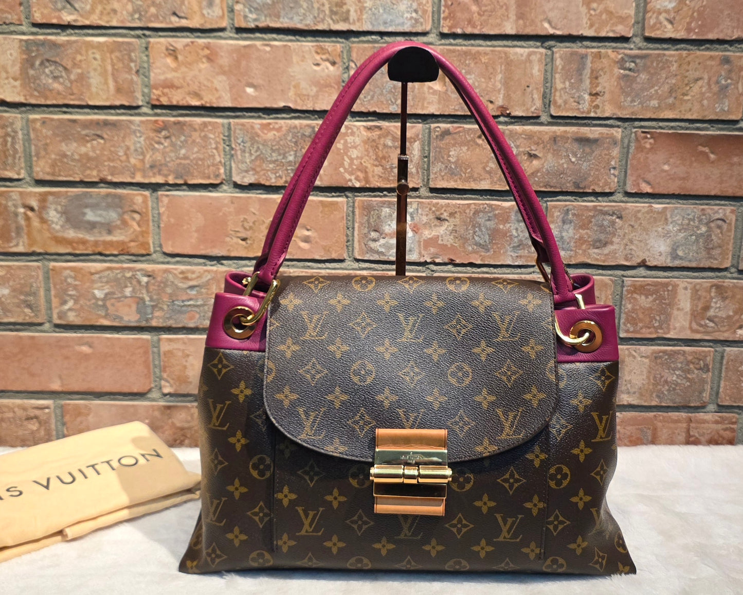 Authentic Louis Vuitton Olympe in Aurore