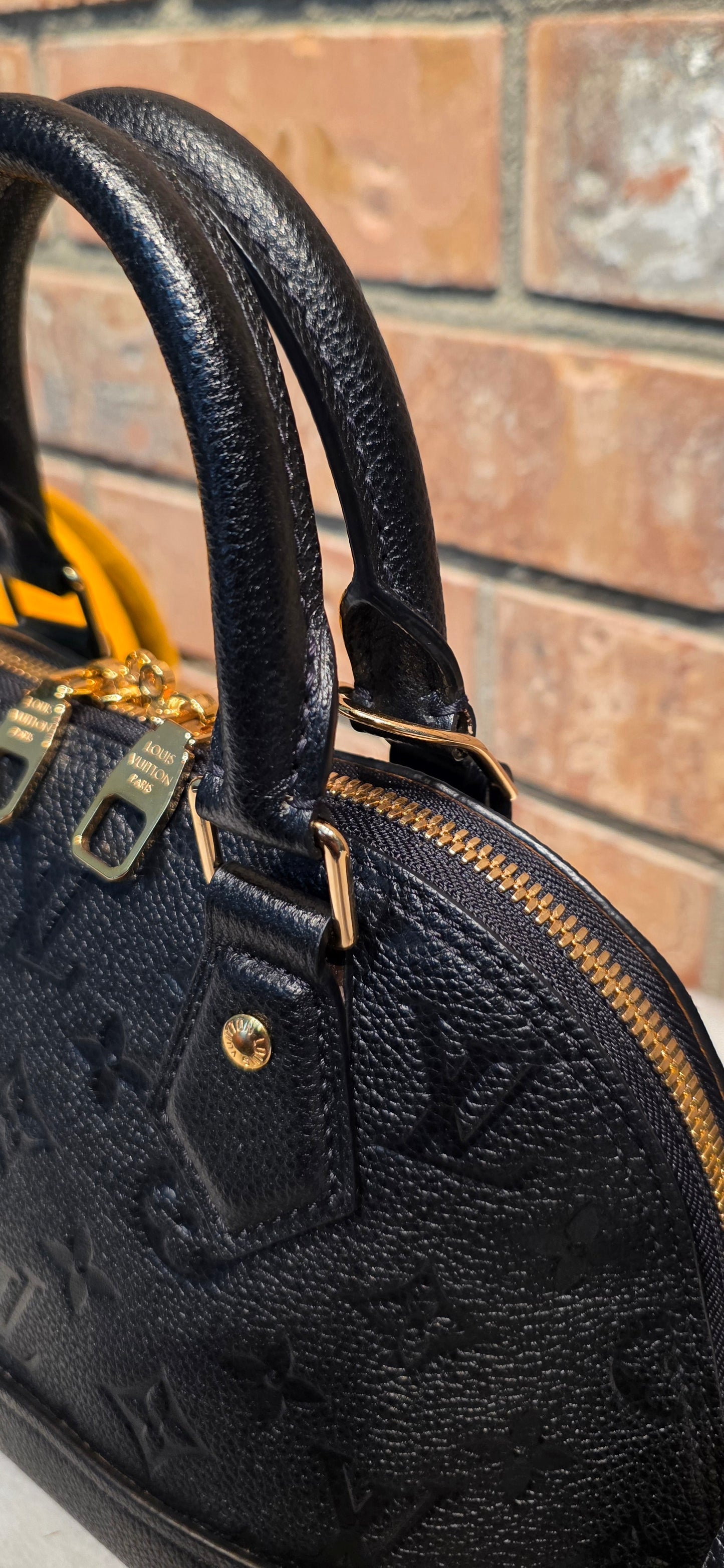 Authentic Louis Vuitton Neo Alma BB Empreinte Noir