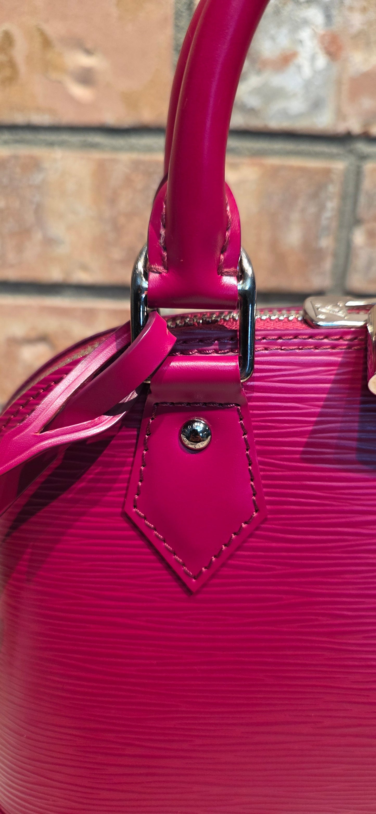 Authentic Louis Vuitton Alma BB Epi Leather in Fuchsia