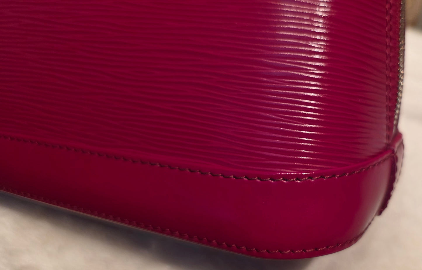 Authentic Louis Vuitton Alma BB Epi Leather in Fuchsia