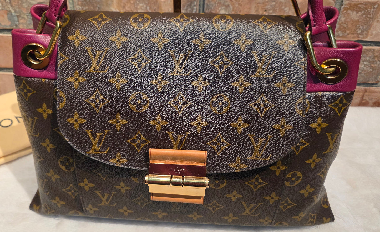 Authentic Louis Vuitton Olympe in Aurore