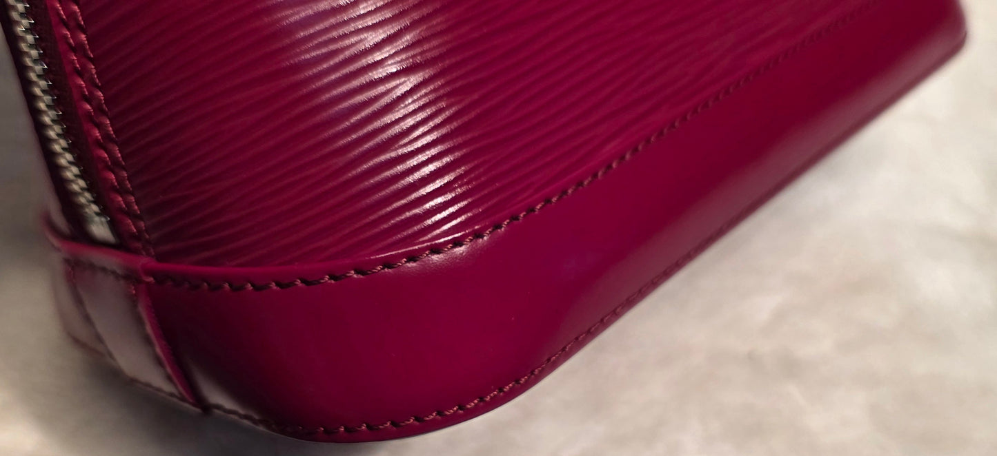 Authentic Louis Vuitton Alma BB Epi Leather in Fuchsia