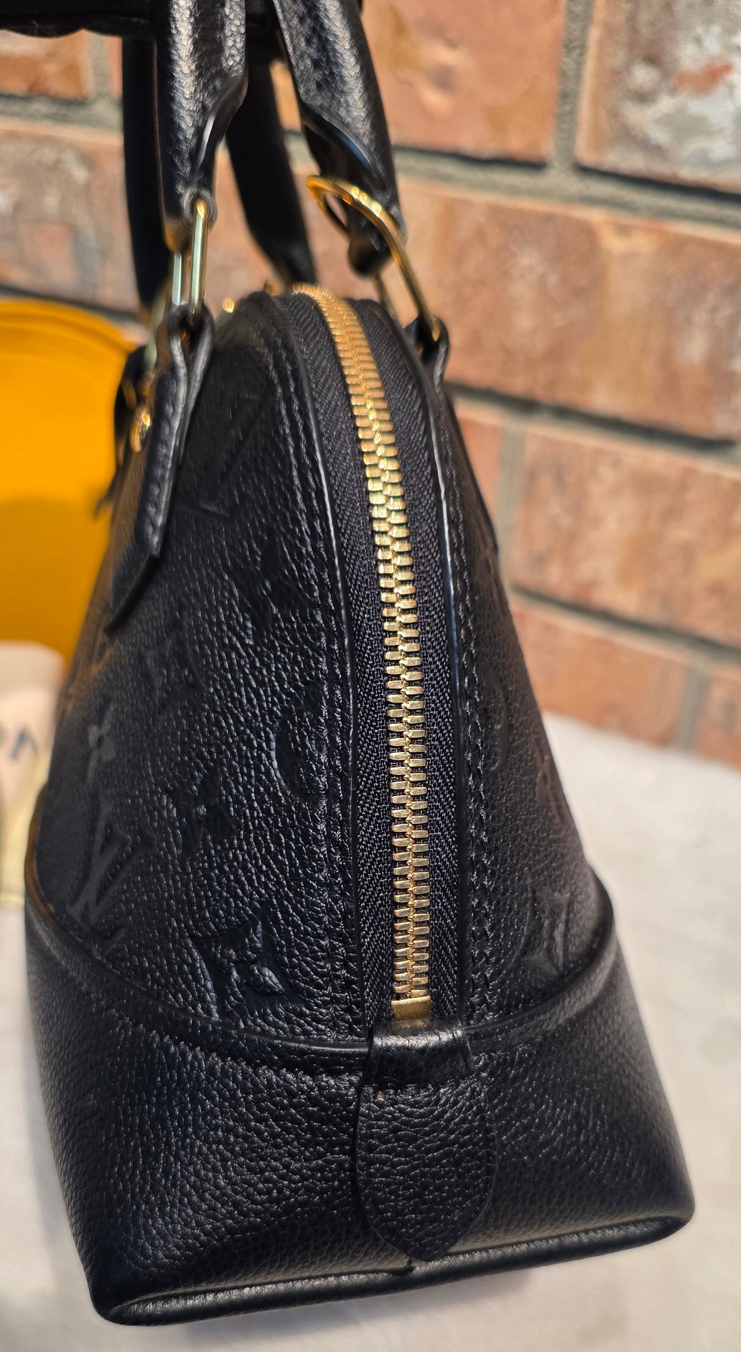 Authentic Louis Vuitton Neo Alma BB Empreinte Noir
